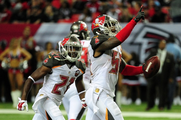 ATLANTA, GA - NOVEMBER 01:  Kwon Alexander #58 of the Tampa Bay Buccaneers celebrates an interception during the first half against the Atlanta Falcons at the Georgia Dome on November 1, 2015 in Atlanta, Georgia.  (Photo by Scott Cunningham/Getty Images)