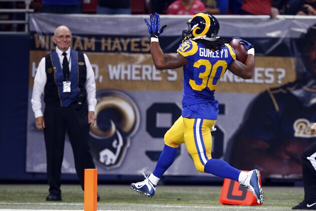 St. Louis Rams running back Todd Gurley scores on a 71-yard run during the second quarter of an NFL football game against the San Francisco 49ers, Sunday, Nov. 1, 2015, in St. Louis. (AP Photo/Billy Hurst)