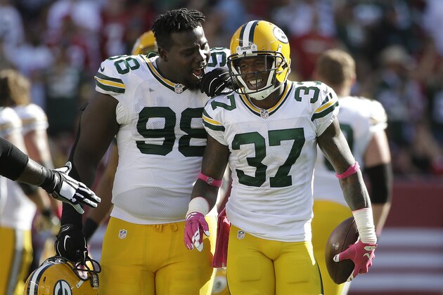 Green Bay Packers cornerback Sam Shields (37) celebrates with nose tackle Letroy Guion (98) after intercepting a pass from San Francisco 49ers quarterback Colin Kaepernick during the second half of an NFL football game in Santa Clara, Calif., Sunday, Oct. 4, 2015. (AP Photo/Marcio Jose Sanchez) Green Bay Packers cornerback Sam Shields (37) celebrates with nose tackle Letroy Guion (98) after intercepting a pass from San Francisco 49ers quarterback Colin Kaepernick during the second half of an NFL football game in Santa Clara, Calif., Sunday, Oct. 4, 2015. (AP Photo/Marcio Jose Sanchez)