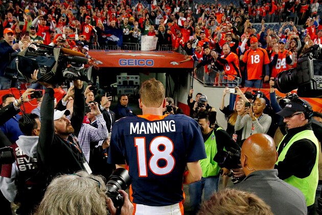 Denver Broncos quarterback Peyton Manning (18) leaves the field after an NFL football game against the Green Bay Packers, Sunday, Nov. 1, 2015, in Denver. With the win, Manning tied Brett Favre with the most wins in NFL history by a starting quarterback with 186. The Broncos won 29-10 to improve to 7-0. (AP Photo/Jack Dempsey)