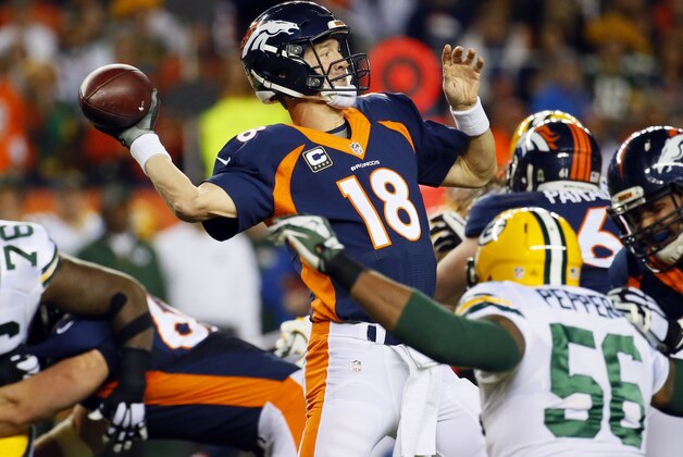 Denver Broncos quarterback Peyton Manning (18) throws against the Green Bay Packers during the first half of an NFL football game, Sunday, Nov. 1, 2015, in Denver. (AP Photo/Jack Dempsey) Denver Broncos quarterback Peyton Manning (18) throws against the Green Bay Packers during the first half of an NFL football game, Sunday, Nov. 1, 2015, in Denver. (AP Photo/Jack Dempsey)