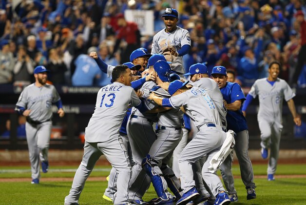 NEW YORK, NY - NOVEMBER 01:  The Kansas City Royals celebrate defeating the New York Mets to win Game Five of the 2015 World Series at Citi Field on November 1, 2015 in the Flushing neighborhood of the Queens borough of New York City. The Kansas City Royals defeated the New York Mets with a score of 7 to 2 to win the World Series.  (Photo by Elsa/Getty Images)