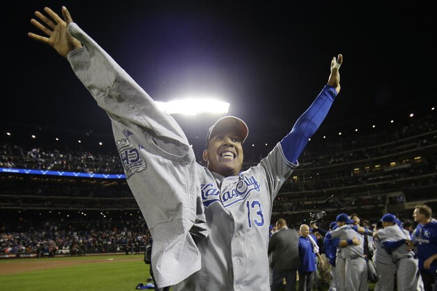 Kansas City Royals catcher Salvador Perez celebrates after being named the MVP after Game 5 of the Major League Baseball World Series against the New York Mets Monday, Nov. 2, 2015, in New York. The Royals won 7-2 to win the series. (AP Photo/Matt Slocum)