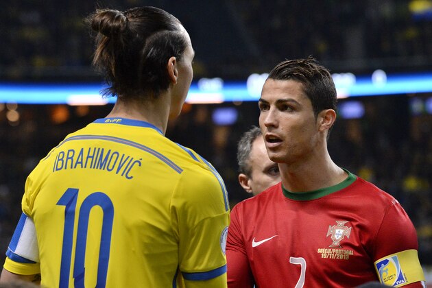 Sweden's forward Zlatan Ibrahimovic (L) shakes hands with Portugal's forward Cristiano Ronaldo prior to the FIFA 2014 World Cup playoff football match Sweden vs Portugal at the Friends Arena in Solna, near Stockholm on November 19, 2013. Portugal won the match 2-3 to secure their place at the World Cup in Brazil. AFP PHOTO/JONATHAN NACKSTRAND        (Photo credit should read JONATHAN NACKSTRAND/AFP/Getty Images)