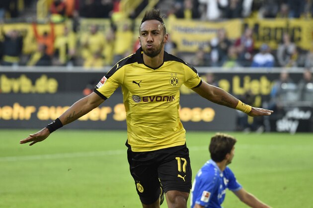 Dortmund's Pierre-Emerick Aubameyang celebrates after scoring his second goal during the German Bundesliga soccer match between Borussia Dortmund and SV Darmstadt in Dortmund, Germany, Sunday, Sept. 27, 2015. (AP Photo/Martin Meissner)