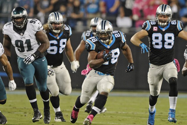 Carolina Panthers' Jonathan Stewart (28) runs against the Philadelphia Eagles in the first half of  an NFL football game in Charlotte, N.C., Sunday, Oct. 25, 2015. (AP Photo/Mike McCarn)