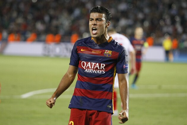 Rafinha of FC Barcelona celebrates after his goal during the Super Cup soccer match between FC Barcelona and Sevilla FC at the Boris Paichadze Dinamo Arena stadium, in Tbilisi, Georgia, on Tuesday, Aug. 11, 2015. (AP Photo/Shakh Aivazov)