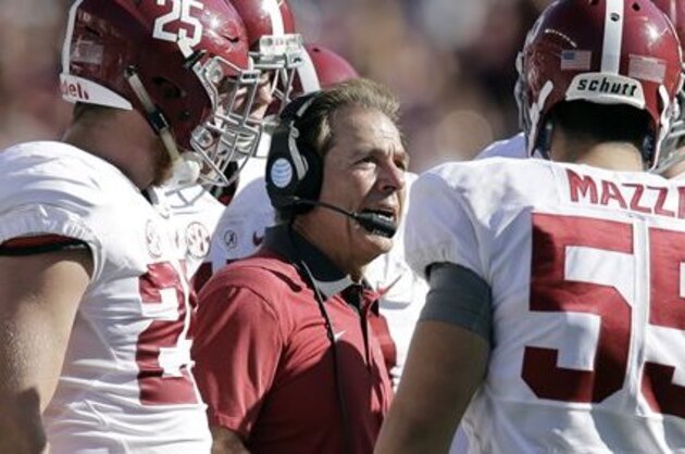 FILE - In this Oct. 17, 2015, file photo, Alabama head coach Nick Saban, center, talks to his players during the first half of an NCAA college football game against Texas A&M in College Station, Texas. The Tide need two things to happen to return to Atlanta: Win out and have LSU beat Ole Miss. (AP Photo/Eric Gay, File)