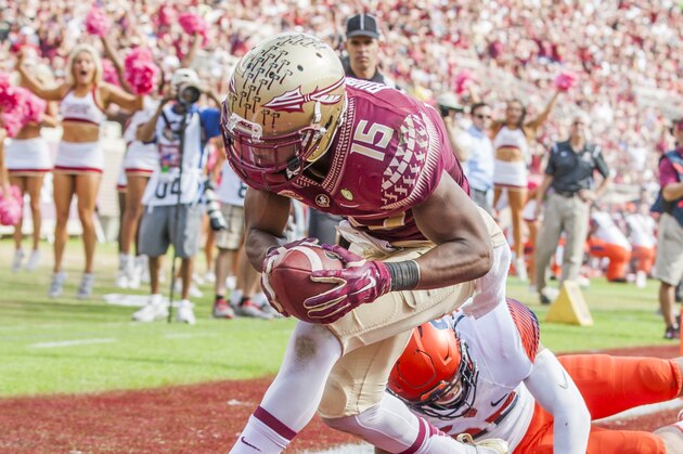 Florida State wide receiver Travis Rudolph scores on a 19 yard reception in the second half of an NCAA college football game against Syracuse in Tallahassee, Fla., Saturday, Oct. 31.  Florida State defeated Syracuse 45-21. (AP Photo/Mark Wallheiser)