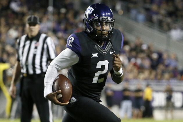 TCU quarterback Trevone Boykin (2) carries the ball against West Virginia during an NCAA college football game Thursday, Oct. 29, 2015, in Fort Worth, Texas. (AP Photo/Tony Gutierrez)