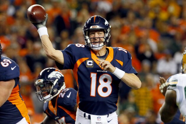 Denver Broncos quarterback Peyton Manning (18) passes against the Green Bay Packers during the first half of an NFL football game, Sunday, Nov. 1, 2015, in Denver. (AP Photo/Joe Mahoney)