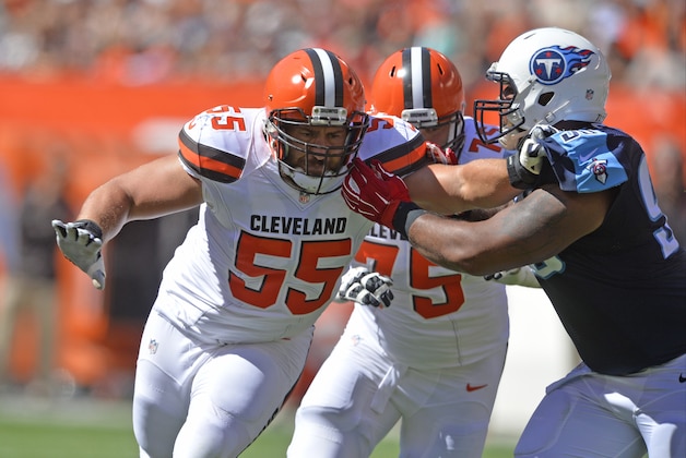 Cleveland Browns center Alex Mack (55) blocks against Tennessee Titans defensive end DaQuan Jones (90) during an NFL football game Sunday, Sept. 20, 2015, in Cleveland. The Browns won 28-14. (AP Photo/David Richard)