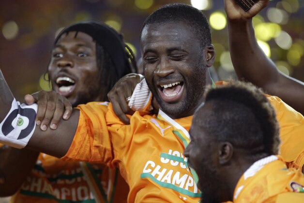 Ivory Coast's Yaya Toure, with teammates, celebrate after winning their African Cup of Nations final soccer match against Ghana in Bata, Equatorial Guinea, Sunday, Feb. 8, 2015. (AP Photo/Themba Hadebe)