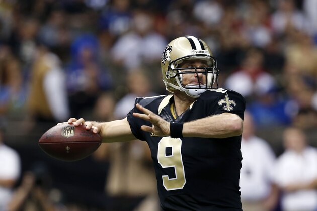 New Orleans Saints quarterback Drew Brees (9) passes in the first half of an NFL football game against the New York Giants in New Orleans, Sunday, Nov. 1, 2015. (AP Photo/Jonathan Bachman)