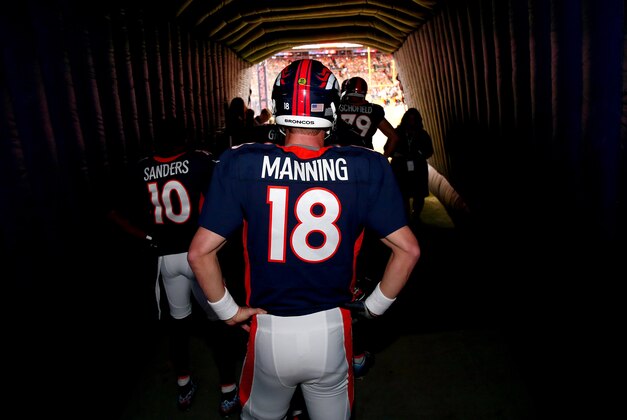 Denver Broncos quarterback Peyton Manning (18) stands in the tunnel before player introductions prior to an NFL football game against the Green Bay Packers, Sunday, Nov. 1, 2015, in Denver. (AP Photo/Jack Dempsey)