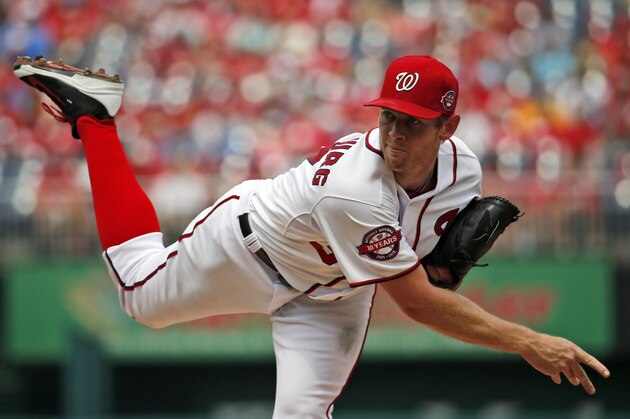Washington Nationals starting pitcher Stephen Strasburg throws during the first inning of a baseball game against the Miami Marlins at Nationals Park, Sunday, Aug. 30, 2015, in Washington. (AP Photo/Alex Brandon)