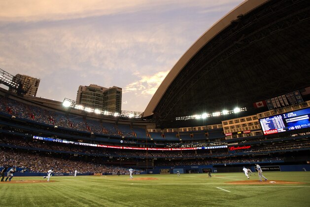 The Toronto Blue Jays play the Los Angeles Dodgers in fourth inning inter-league action under an open dome in Toronto on Monday July 22, 2013. THE CANADIAN PRESS/Frank Gunn