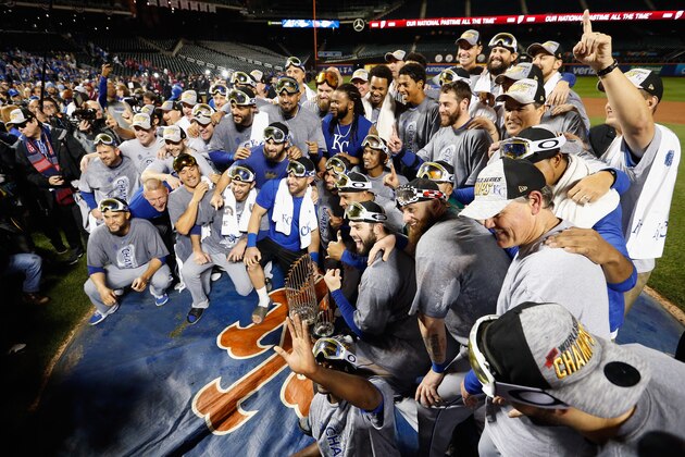 NEW YORK, NY - NOVEMBER 01:  The Kansas City Royals celebrate defeating the New York Mets to win Game Five of the 2015 World Series at Citi Field on November 1, 2015 in the Flushing neighborhood of the Queens borough of New York City. The Kansas City Royals defeated the New York Mets with a score of 7 to 2 to win the World Series.  (Photo by Sean M. Haffey/Getty Images)