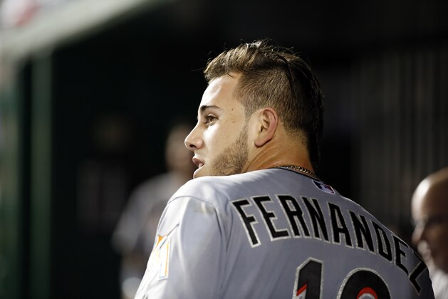 Miami Marlins starting pitcher Jose Fernandez walks in the dugout during a baseball game against the Washington Nationals at Nationals Park, Friday, Sept. 18, 2015, in Washington. (AP Photo/Alex Brandon)