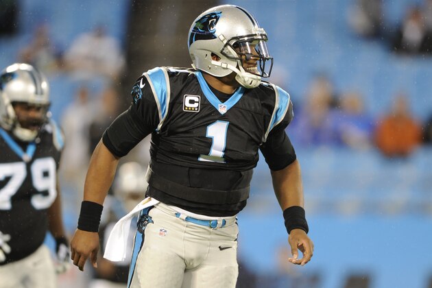 Carolina Panthers' Cam Newton (1) warms up before an NFL football game against the Indianapolis Colts in Charlotte, N.C., Monday, Nov. 2, 2015. (AP Photo/Mike McCarn)