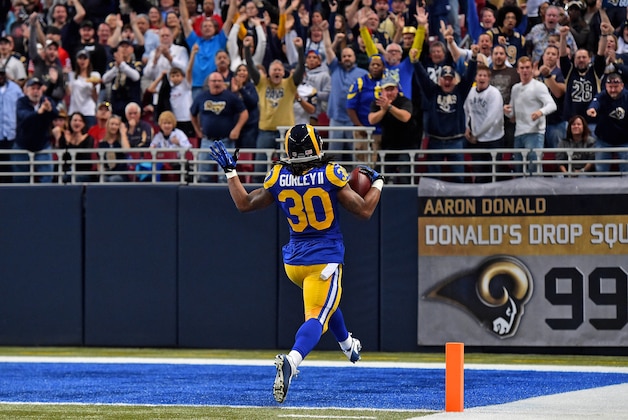 Nov 1, 2015; St. Louis, MO, USA; St. Louis Rams running back Todd Gurley (30) celebrates after scoring a seventy one yard touchdown against the San Francisco 49ers during the first half at the Edward Jones Dome. Mandatory Credit: Jasen Vinlove-USA TODAY Sports