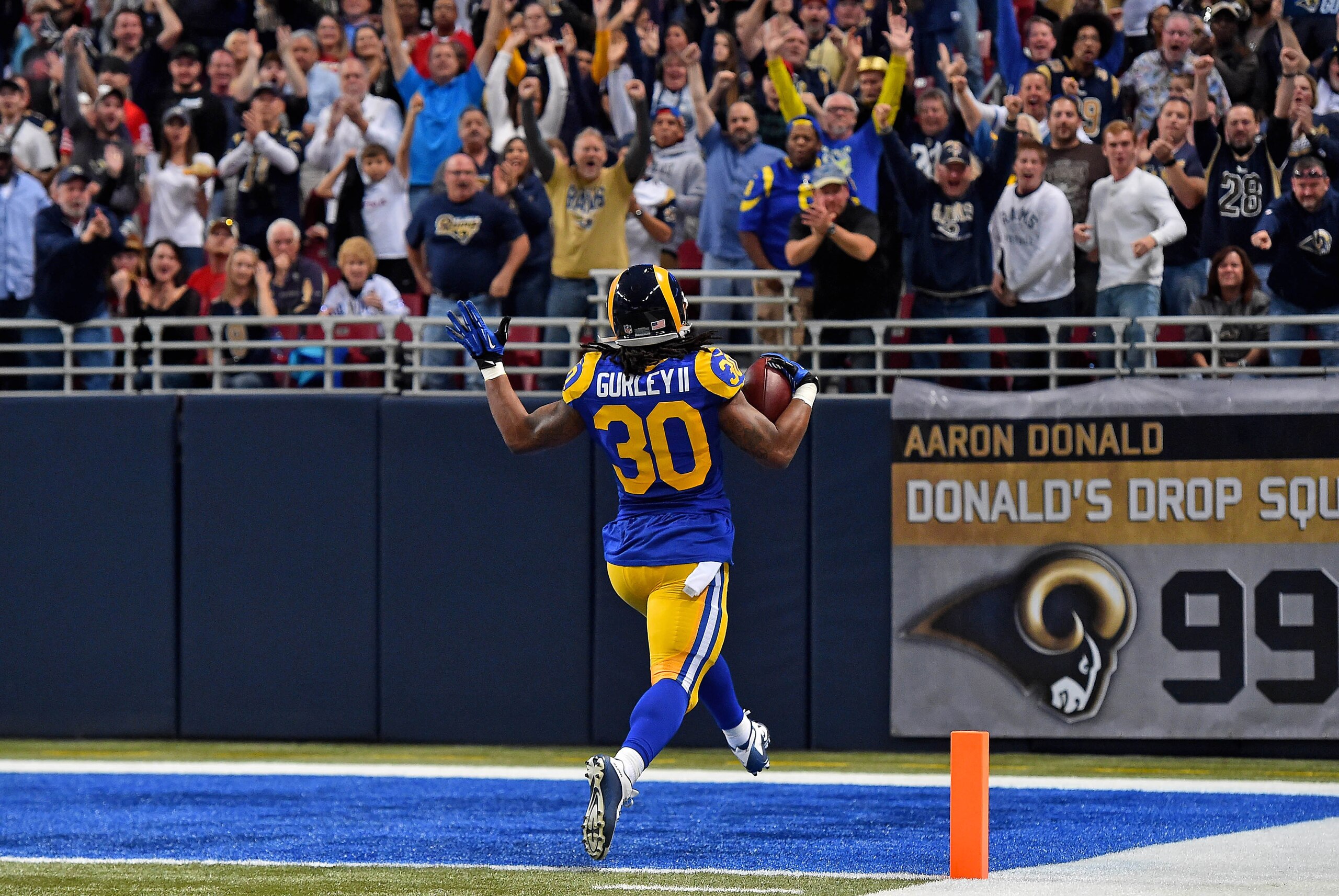 Nov 1, 2015; St. Louis, MO, USA; St. Louis Rams running back Todd Gurley (30) celebrates after scoring a seventy one yard touchdown against the San Francisco 49ers during the first half at the Edward Jones Dome. Mandatory Credit: Jasen Vinlove-USA TODAY Sports