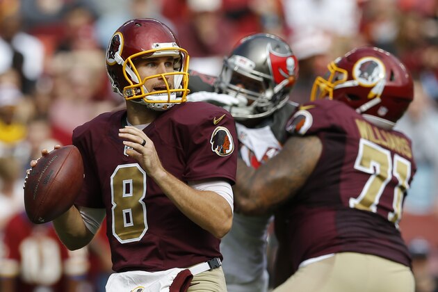 In this photo taken Oct. 25, 2015, Washington Redskins quarterback Kirk Cousins (8) passes the ball during the first half of an NFL football game against the Tampa Bay Buccaneers in Landover, Md. If Kirkthrows an interception in a game, he throws a second, and the Washington Redskins lose. If Cousins plays a pick-free game, the Redskins win. It really is that simple so far this season.  (AP Photo/Patrick Semansky)