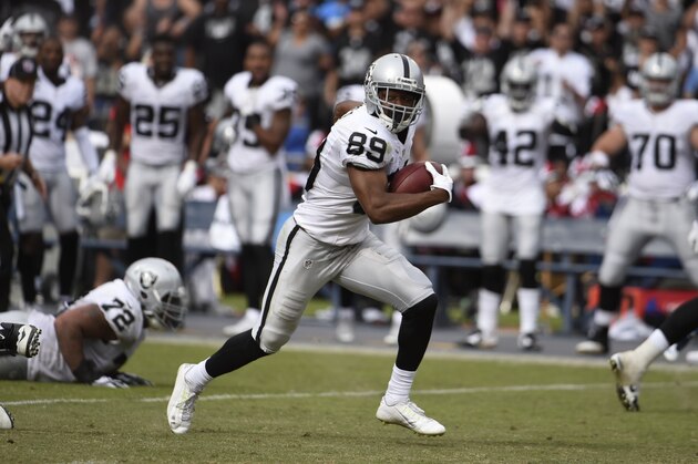 Oakland Raiders wide receiver Amari Cooper runs on his way to scoring a touchdown during the first half of an NFL football game against the San Diego Chargers Sunday, Oct. 25, 2015, in San Diego. (AP Photo/Denis Poroy)