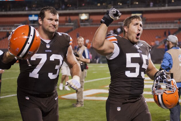 CLEVELAND, OH - OCTOBER 3: Tackle Joe Thomas #73 and center Alex Mack #55 of the Cleveland Browns celebrate after defeating the Buffalo Bills during the first half at FirstEnergy Stadium on October 3, 2013 in Cleveland, Ohio. The Browns defeated the Bills 37-24. (Photo by Jason Miller/Getty Images)