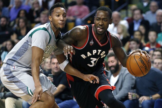 Toronto Raptors' Terrence Ross (31) drives past Boston Celtics' Evan Turner (11) during the fourth quarter of an NBA basketball game in Boston, Friday, Oct. 30, 2015. The Raptors won 113-103. (AP Photo/Michael Dwyer)
