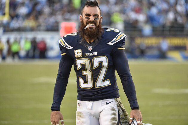 San Diego Chargers free safety Eric Weddle (32) laughs on the sidelines during the fourth quarter of an NFL football game against the Oakland Raiders Sunday, Nov. 16, 2014, in San Diego.  (AP Photo/Denis Poroy)