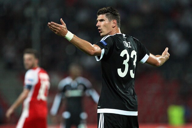 Besiktas' Mario Gomez reacts during the UEFA Europa League Group H football match between KF Skenderbeu and Besiktas JK at the Elbansan Arena in Elbasan on September 17, 2015. AFP PHOTO / GENT SHKULLAKU        (Photo credit should read GENT SHKULLAKU/AFP/Getty Images)