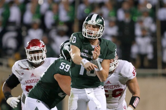 Michigan State quarterback Connor Cook throws a pass against Indiana during the fourth quarter of an NCAA college football game, Saturday, Oct. 24, 2015, in East Lansing, Mich. Michigan State won 52-26. (AP Photo/Al Goldis)