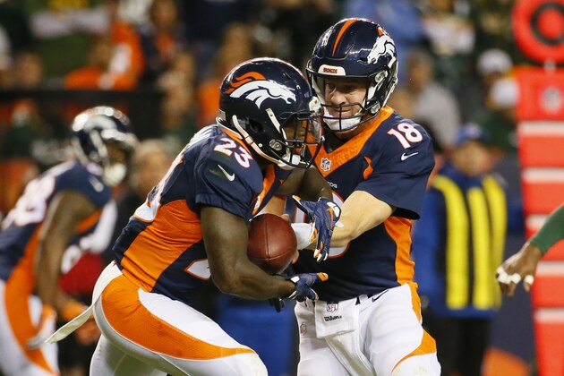 Denver Broncos quarterback Peyton Manning (18) hands off to Ronnie Hillman during an NFL football game between the Denver Broncos and the Green Bay Packers, Sunday, Nov. 1, 2015, in Denver. (AP Photo/Jack Dempsey)