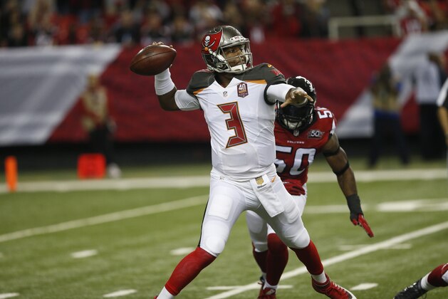 Tampa Bay Buccaneers quarterback Jameis Winston (3) works against the Atlanta Falcons during the first of an NFL football game, Sunday, Nov. 1, 2015, in Atlanta. (AP Photo/John Bazemore)