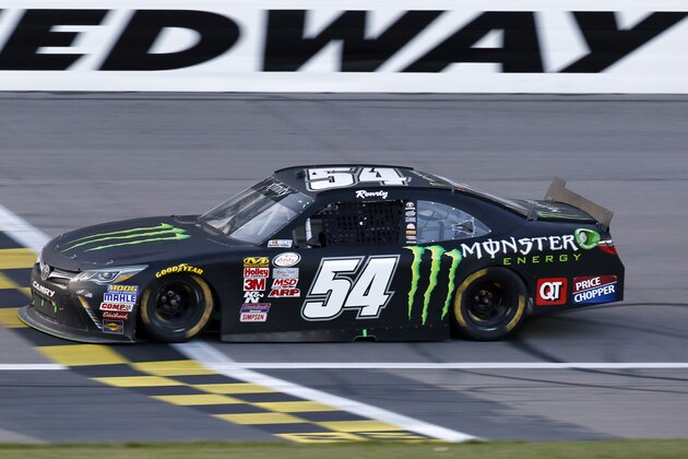NASCAR Xfinity Series driver Kyle Busch crosses the finish line to win the Kansas Lottery 300 auto race at Kansas Speedway in Kansas City, Kan., Saturday, Oct. 17, 2015. (AP Photo/Colin E. Braley)