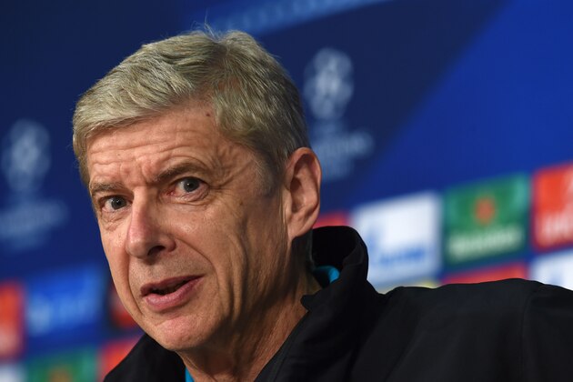 Arsenal's French head coach Arsene Wenger laughs addresses a press conference on the eve of the UEFA Champions League Group F second-leg football match between Bayern Munich and Arsenal FC in Munich, southern Germany, on November 3, 2015.  AFP PHOTO / CHRISTOF STACHE        (Photo credit should read CHRISTOF STACHE/AFP/Getty Images)