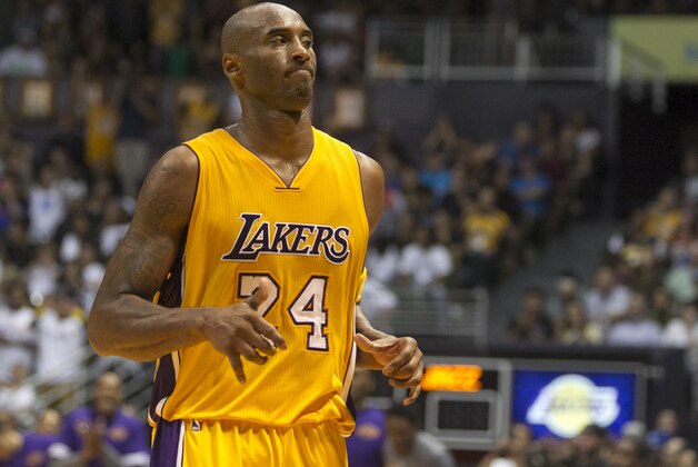 Los Angeles Lakers guard Kobe Bryant (24) is seen on the court during the second half of an NBA preseason basketball game against the Utah Jazz, Tuesday, Oct. 6, 2015, in Honolulu.  The Jazz defeated the Lakers 117-114.  (AP Photo/Marco Garcia)