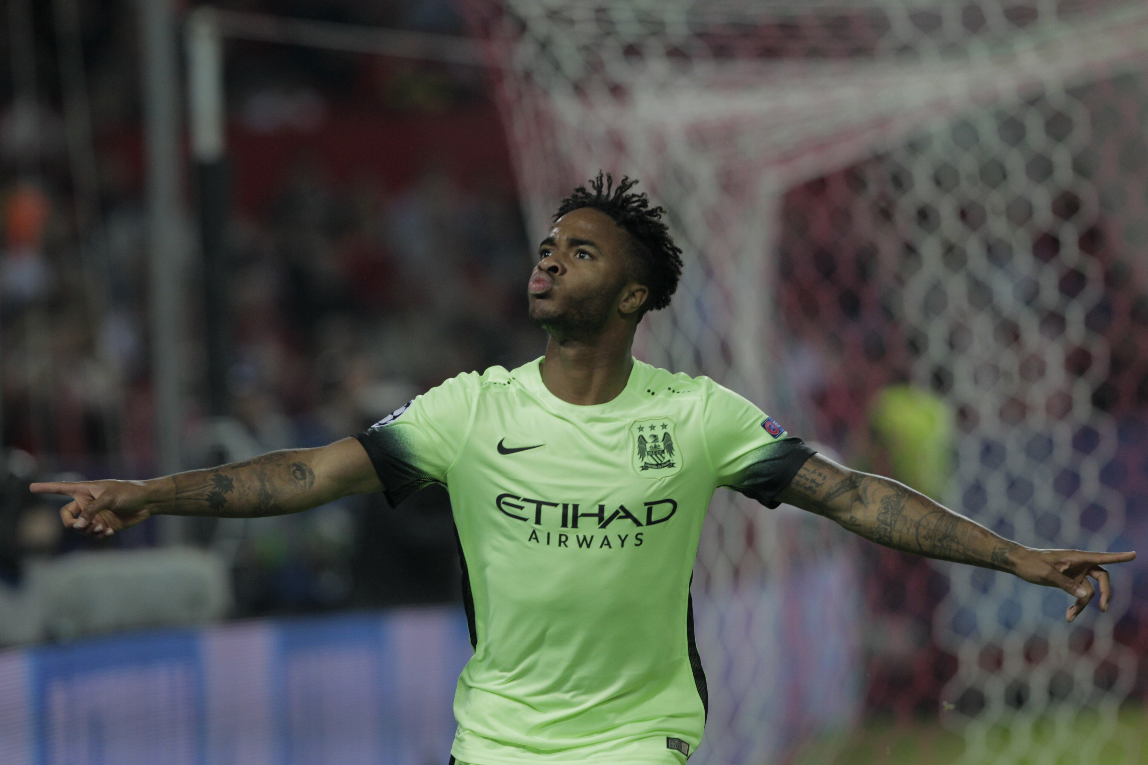 Manchester City's Raheem Sterling celebrates after scoring the opening goal during the Group D Champions League soccer match between Sevilla and Manchester City at the Ramon Sanchez-Pizjuan stadium in Seville, Spain, Tuesday Nov. 3, 2015. (AP Photo/Miguel Angel Morenatti) Manchester City's Raheem Sterling celebrates after scoring the opening goal during the Group D Champions League soccer match between Sevilla and Manchester City at the Ramon Sanchez-Pizjuan stadium in Seville, Spain, Tuesday Nov. 3, 2015. (AP Photo/Miguel Angel Morenatti)