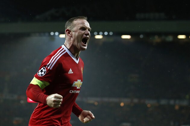 Manchester United's Wayne Rooney celebrates scoring the opening goal during the Champions League Group B soccer match between Manchester United and CSKA Moskva at Old Trafford Stadium, Manchester, England, Tuesday, Nov. 3, 2015. (AP Photo/Jon Super)