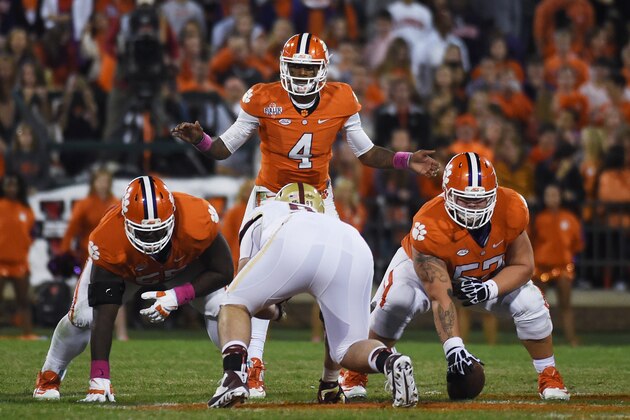 Clemson quarterback Deshaun Watson (4) gestures at the line of scrimmage before a play against Boston College during the second half of an NCAA college football game, Saturday, Oct. 17, 2015, in Clemson, S.C. (AP Photo/Rainier Ehrhardt)