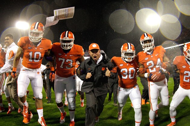 CLEMSON, SC - OCTOBER 3: Head Coach Dabo Swinney of the Clemson Tigers leads his team during warm ups prior to the game against the Notre Dame Fighting Irish at Clemson Memorial Stadium on October 3, 2015 in Clemson, South Carolina. (Photo by Tyler Smith/Getty Images)