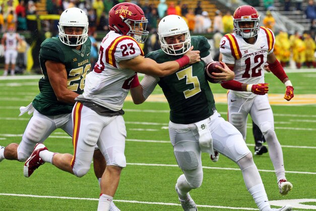 Oct 24, 2015; Waco, TX, USA; Baylor Bears quarterback Jarrett Stidham (3) is tackled by Iowa State Cyclones defensive back Darian Cotton (23) during the second half at McLane Stadium. Baylor won 45-27. Mandatory Credit: Ray Carlin-USA TODAY Sports