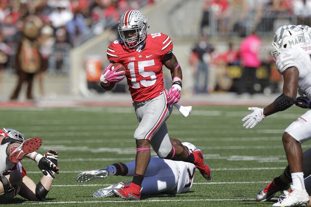 Ohio State running back Ezekiel Elliott plays against Maryland in an NCAA college football game Saturday, Oct. 10, 2015, in Columbus, Ohio. (AP Photo/Jay LaPrete)