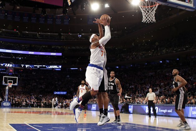 New York Knicks' Carmelo Anthony (7) drives to the basket during the first half of an NBA basketball game against the San Antonio Spurs Monday, Nov. 2, 2015, in New York. (AP Photo/Frank Franklin II)