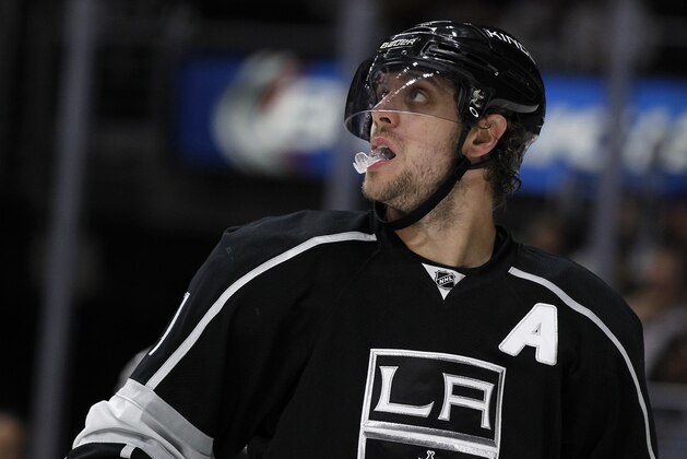 Los Angeles Kings center Anze Kopitar, of Slovenia, looks up at the scoreboard during the third period of an NHL hockey game in Los Angeles, Saturday, Oct. 31, 2015. The Kings won 4-3 in overtime. (AP Photo/Alex Gallardo)