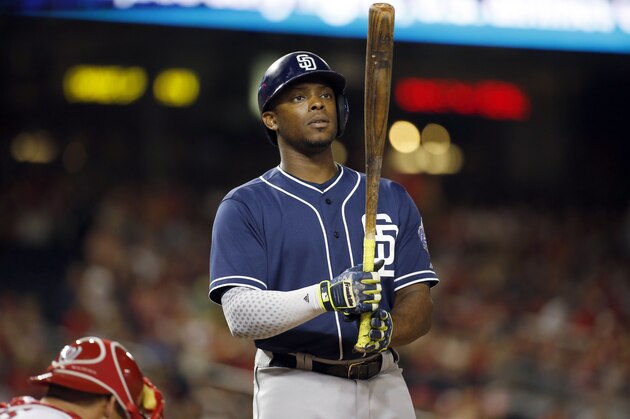 San Diego Padres left fielder Justin Upton (10) bats during a baseball game against the Washington Nationals at Nationals Park, Wednesday, Aug. 26, 2015, in Washington. The Padres won 6-5. (AP Photo/Alex Brandon)