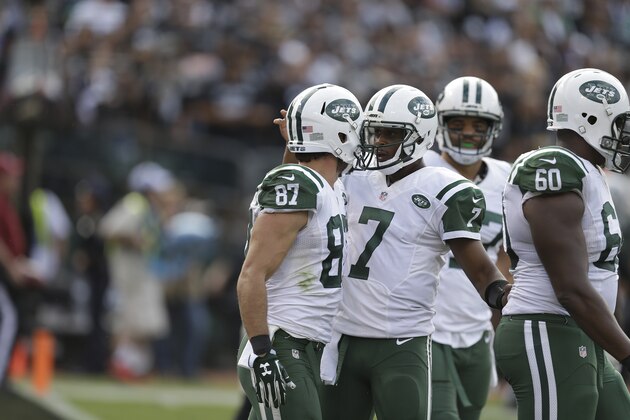 New York Jets wide receiver Eric Decker (87) and quarterback Geno Smith (7) celebrate after connecting on a touchdown pass against the Oakland Raiders during the second half of an NFL football game in Oakland, Calif., Sunday, Nov. 1, 2015. (AP Photo/Ben Margot)