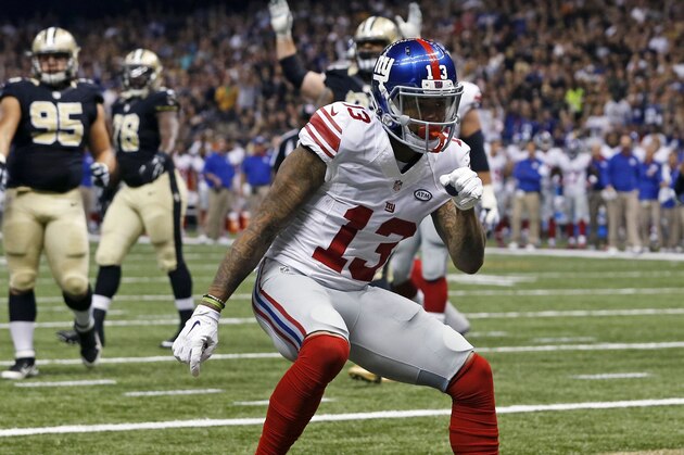New York Giants wide receiver Odell Beckham (13) celebrates his touchdown reception in the first half of an NFL football game against the New Orleans Saints in New Orleans, Sunday, Nov. 1, 2015. (AP Photo/Jonathan Bachman)