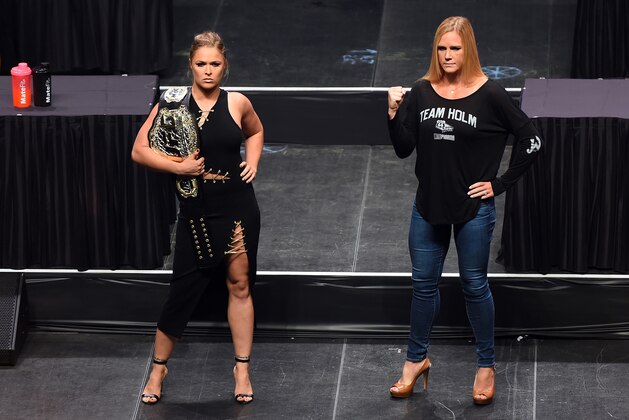 LAS VEGAS, NEVADA - SEPTEMBER 04:  (L-R) UFC women's bantamweight champion Ronda 'Rowdy' Rousey and challenger Holly Holm pose for the media during the UFC's Go Big launch event inside MGM Grand Garden Arena on September 4, 2015 in Las Vegas, Nevada. (Photo by Jeff Bottari/Zuffa LLC/Zuffa LLC via Getty Images)